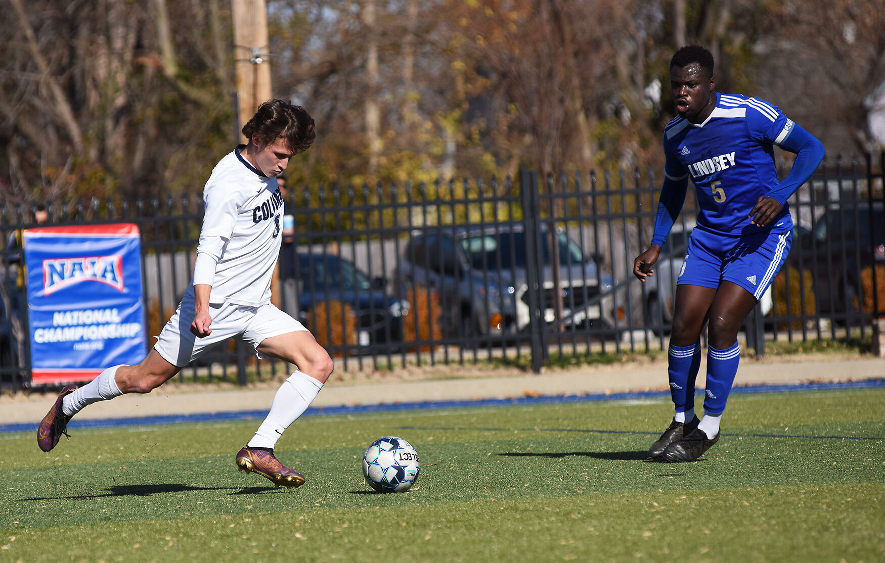 Steven Marion, left, attacks Lindsey Wilson defender Anouar Adam